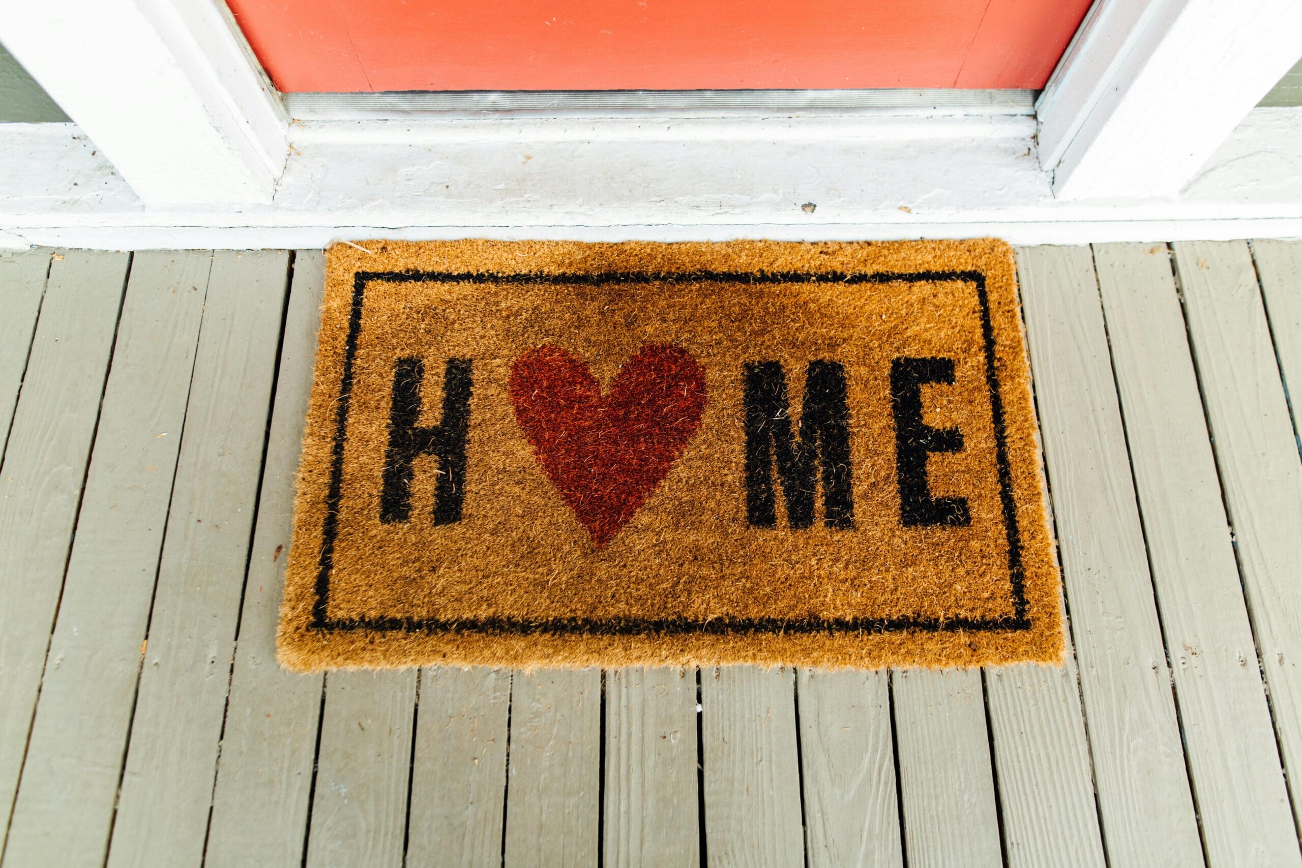 Home welcome mat in front of door